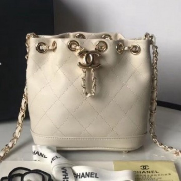 Chanel Quilted Leather Chain Drawstring Mini Bucket Bag White 2019 Collection AQ02589 Chanel Quilted Leather Chain Drawstring Mini Bucket Bag White 2019 Collection AQ02589