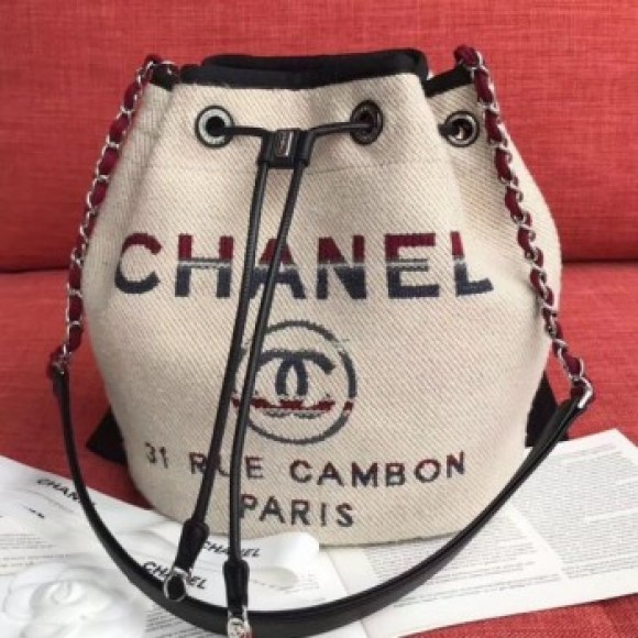Chanel Fabric Logo Print Small Drawstring Bucket Bag Beige White 2019 Collection AQ04023 Chanel Fabric Logo Print Small Drawstring Bucket Bag Beige White 2019 Collection AQ04023