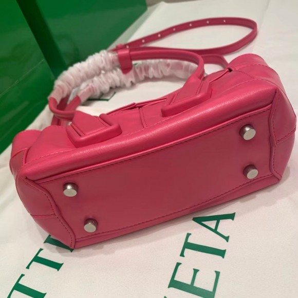 Bo*te*ga ve*ne*ta arco mini bag in pink intrecciato leather