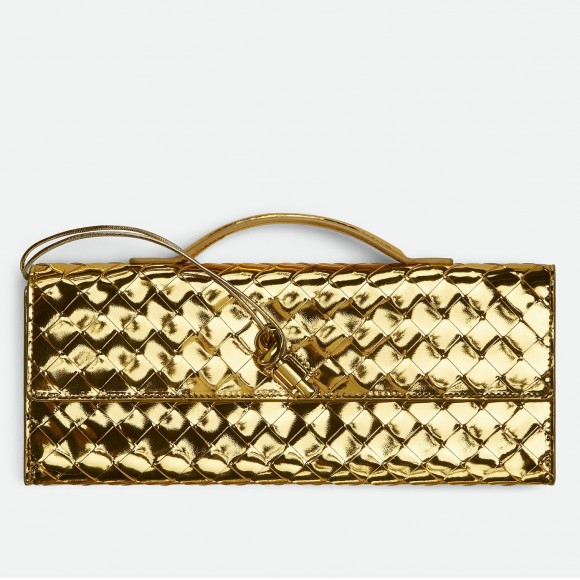 Bo*te*ga ve*ne*ta andiamo clutch with handle in gold metallic leather