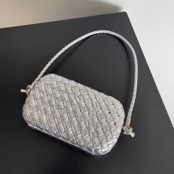 Bo*te*ga ve*ne*ta knot minaudiere on strap in silver intreccio laminated leather