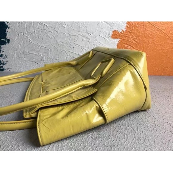 Bo*te*ga ve*ne*ta arco medium bag in yellow intrecciato leather