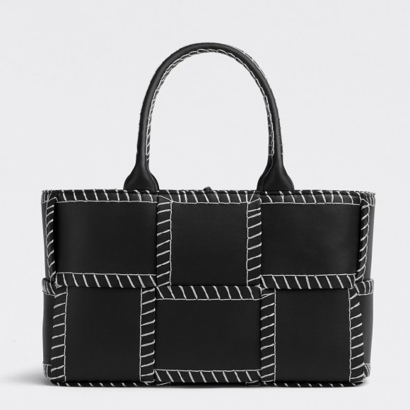 Bo*te*ga ve*ne*ta arco small tote with white overlock stitching