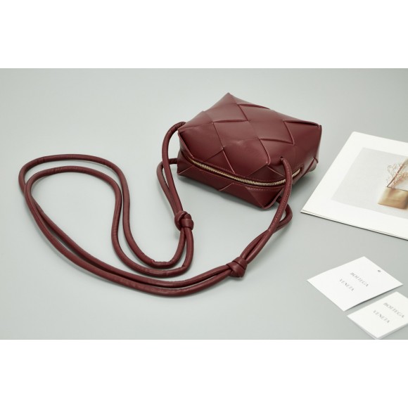 Bo*te*ga ve*ne*ta mini cassette camera bag in bordeaux lambskin