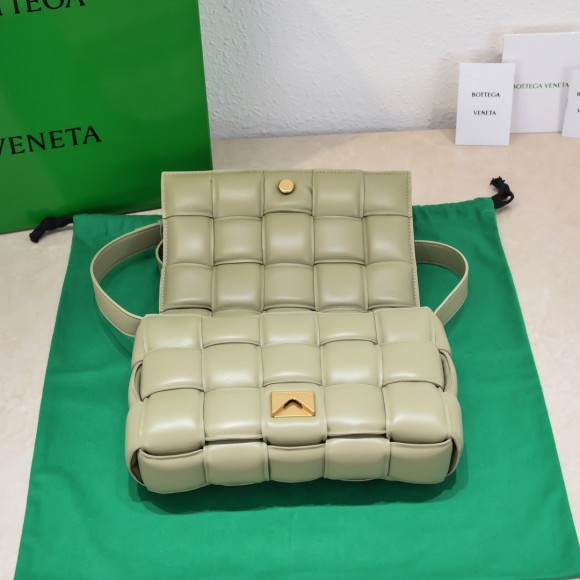 Bo*te*ga ve*ne*ta padded cassette bag in travertine intrecciato lambskin