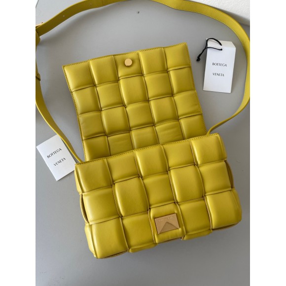 Bo*te*ga ve*ne*ta padded cassette bag in yellow intrecciato lambskin