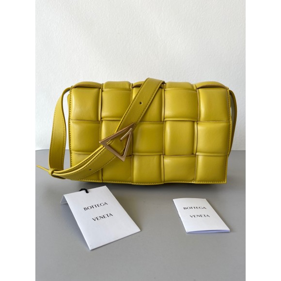 Bo*te*ga ve*ne*ta padded cassette bag in yellow intrecciato lambskin