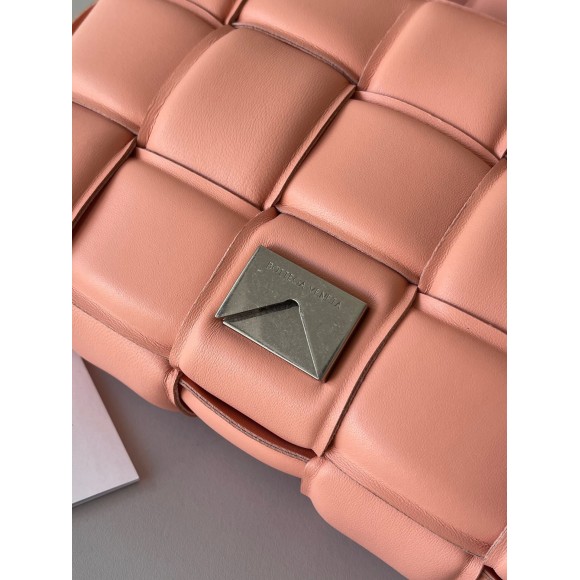 Bo*te*ga ve*ne*ta padded cassette bag in peachy intrecciato lambskin