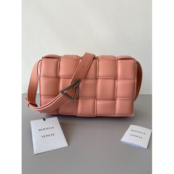 Bo*te*ga ve*ne*ta padded cassette bag in peachy intrecciato lambskin