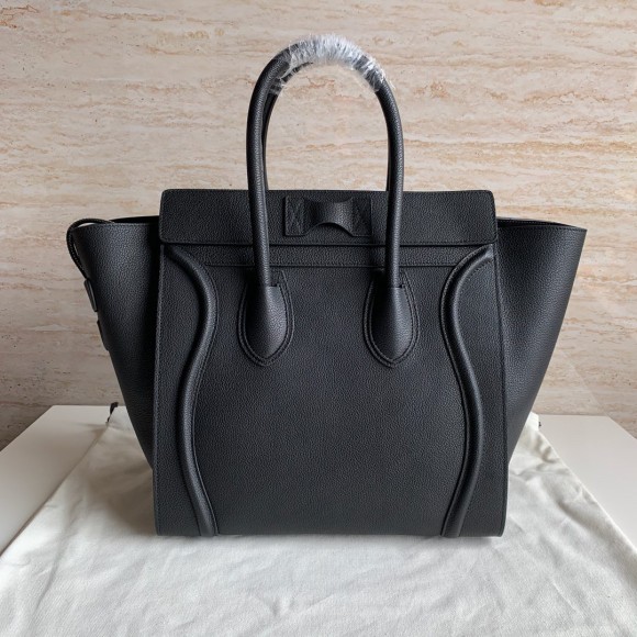 Ce**e mini luggage tote bag in black drummed calfskin