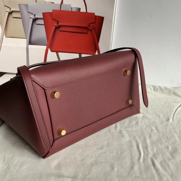 Ce**e belt mini bag in bordeaux grained calfskin