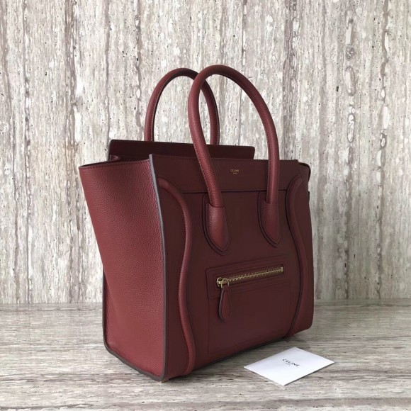 Ce**e micro luggage tote bag in dark red drummed calfskin