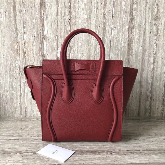 Ce**e micro luggage tote bag in dark red drummed calfskin