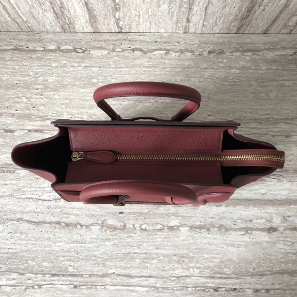 Ce**e micro luggage tote bag in dark red drummed calfskin