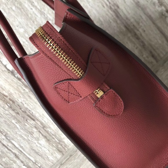 Ce**e micro luggage tote bag in dark red drummed calfskin