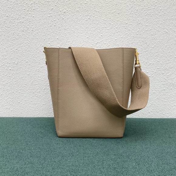 Ce**e sangle small bucket bag in taupe calfskin