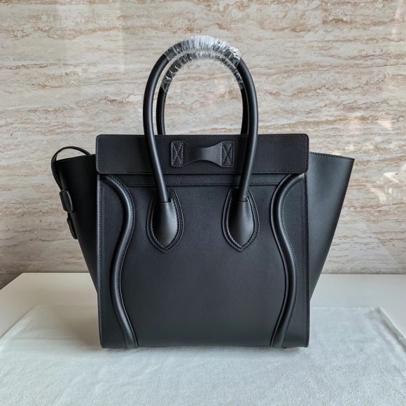 Ce**e micro luggage tote bag in black smooth calfskin