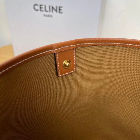 Ce**e small bucket bag in tan triomphe canvas