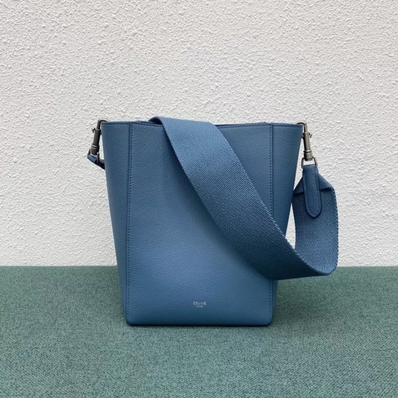 Ce**e sangle small bucket bag in slate blue calfskin