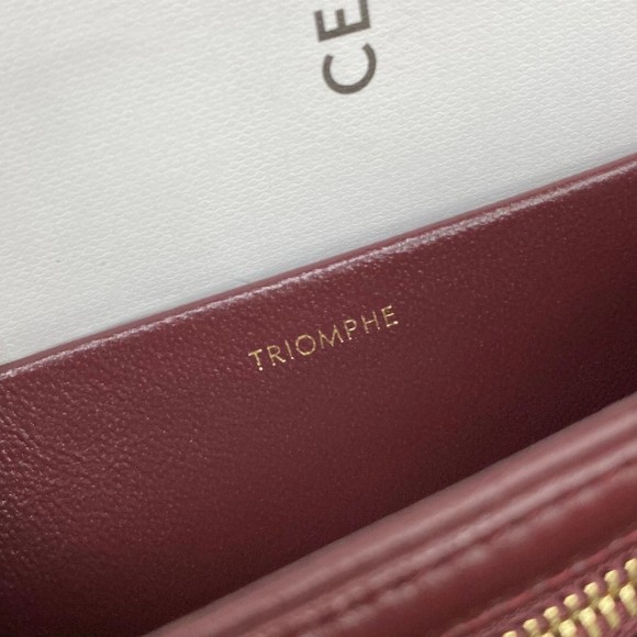 Ce**e triomphe medium bag in bordeaux smooth calfskin