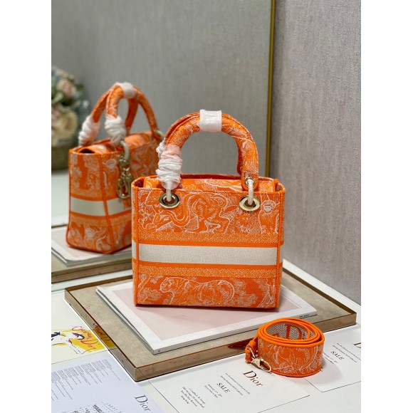 D*or lady d-lite medium bag in fluorescent orange toile de jouy reverse embroidery