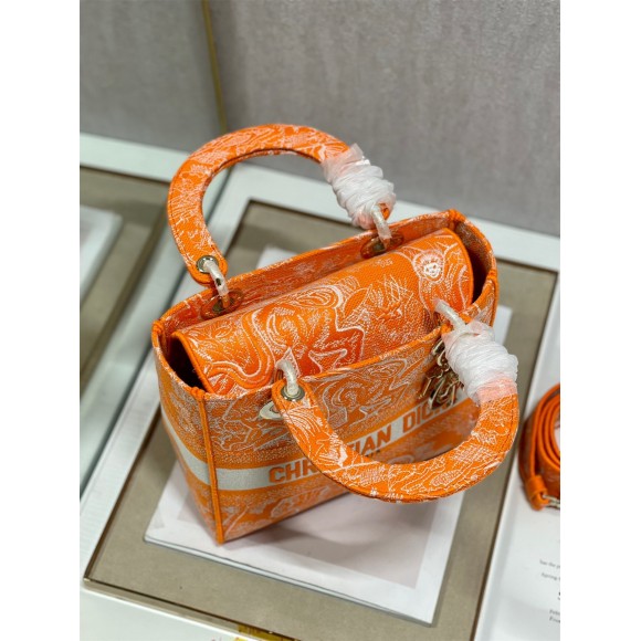 D*or lady d-lite medium bag in fluorescent orange toile de jouy reverse embroidery