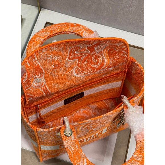 D*or lady d-lite medium bag in fluorescent orange toile de jouy reverse embroidery