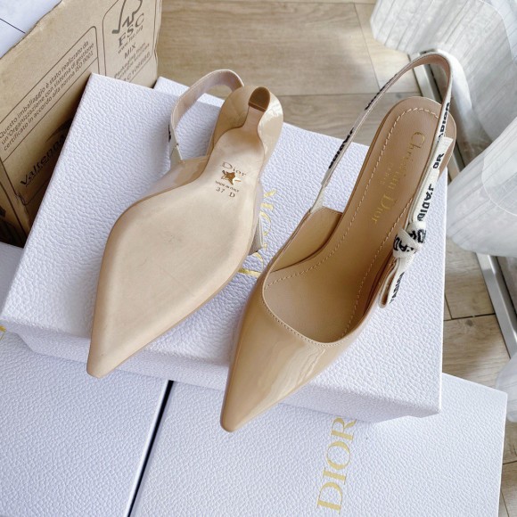 D*or j'aD*or slingback pumps 100mm in nude patent calfskin