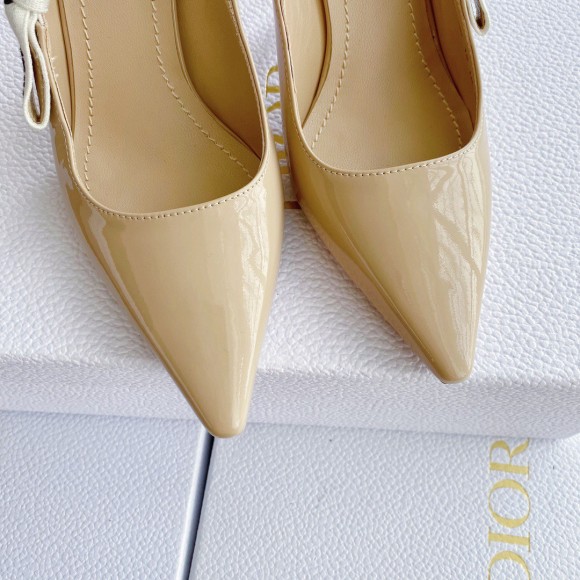 D*or j'aD*or slingback pumps 100mm in nude patent calfskin