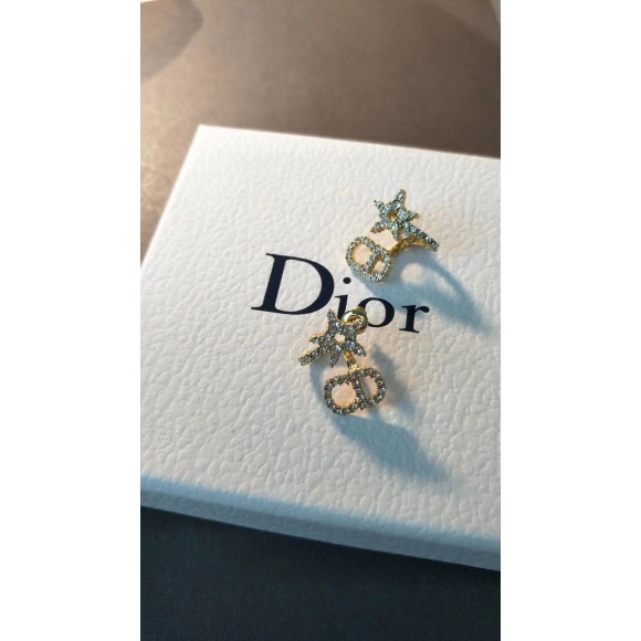 D*or clair d lune earrings in gold-finish metal and white crystals