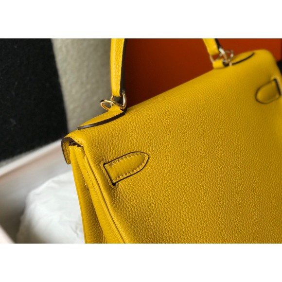 H**mes kelly 28cm retourne bag in yellow clemence leather ghw