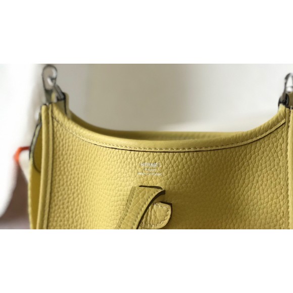 H**mes evelyne iii mini bag in jaune poussin clemence leather