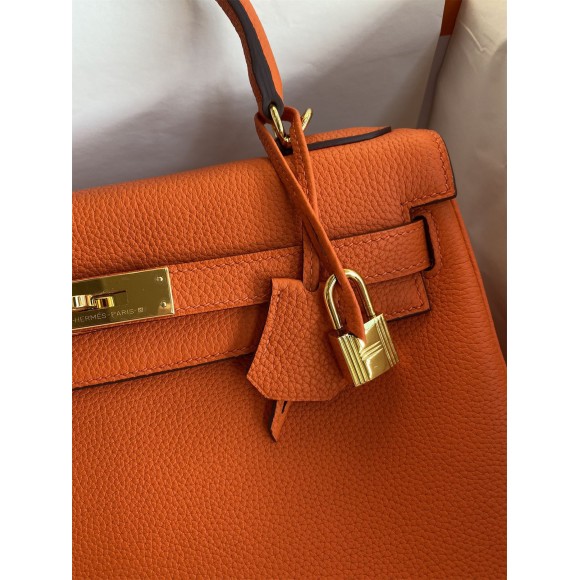 H**mes kelly retourne 32 handmade bag in orange clemence leather