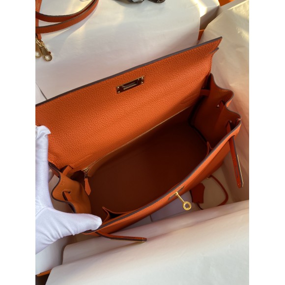 H**mes kelly retourne 32 handmade bag in orange clemence leather