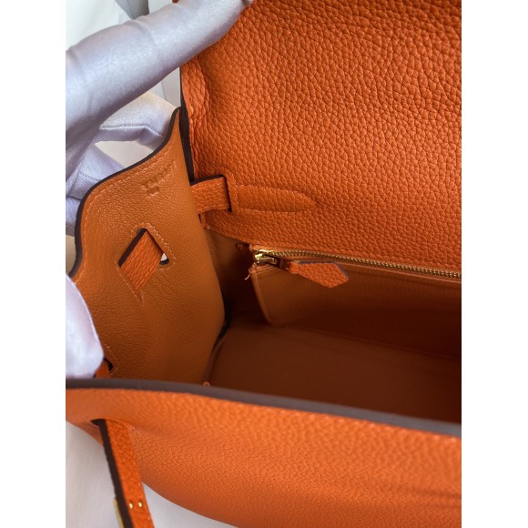 H**mes kelly retourne 32 handmade bag in orange clemence leather