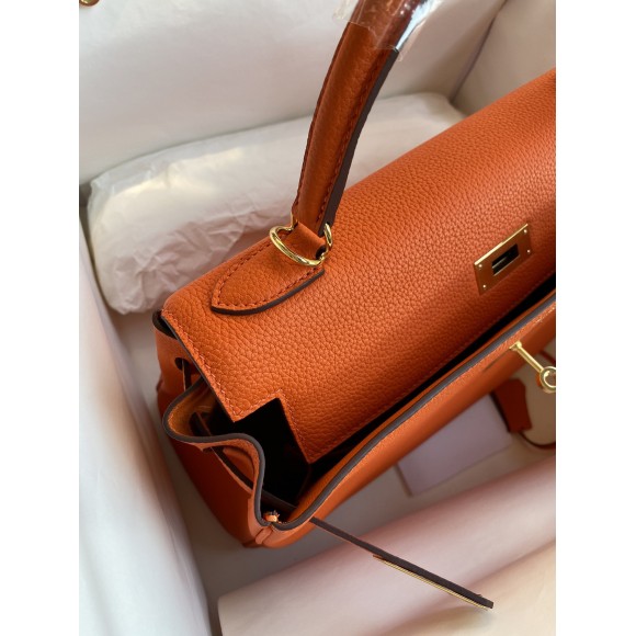 H**mes kelly retourne 32 handmade bag in orange clemence leather