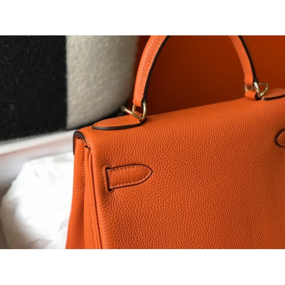 H**mes kelly 28cm retourne bag in orange clemence leather ghw