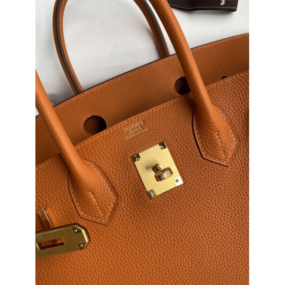 H**mes birkin 25 retourne handmade bag in orange clemence leather