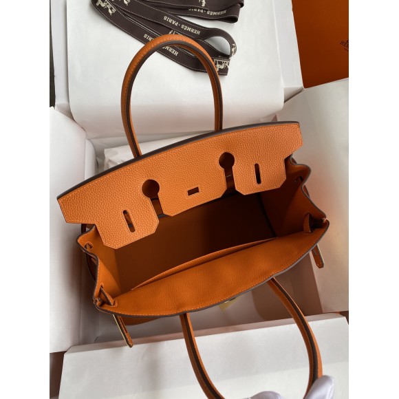 H**mes birkin 25 retourne handmade bag in orange clemence leather