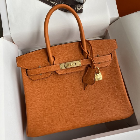 H**mes birkin 25 retourne handmade bag in orange clemence leather