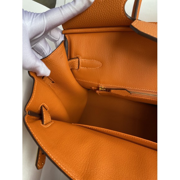 H**mes birkin 25 retourne handmade bag in orange clemence leather