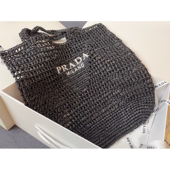 Pra*a large tote bag in black woven raffia