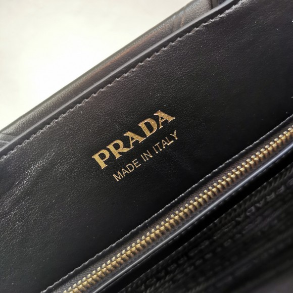 Pra*a symbole small bag with topstitching in black leather