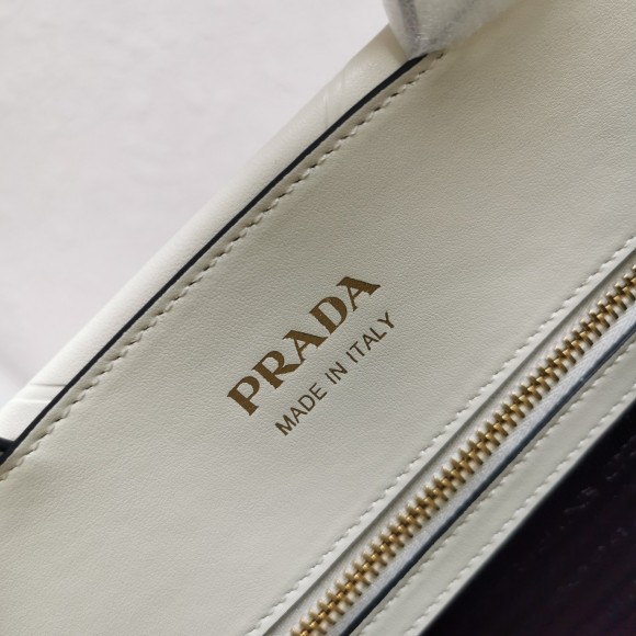 Pra*a symbole small bag with topstitching in white leather