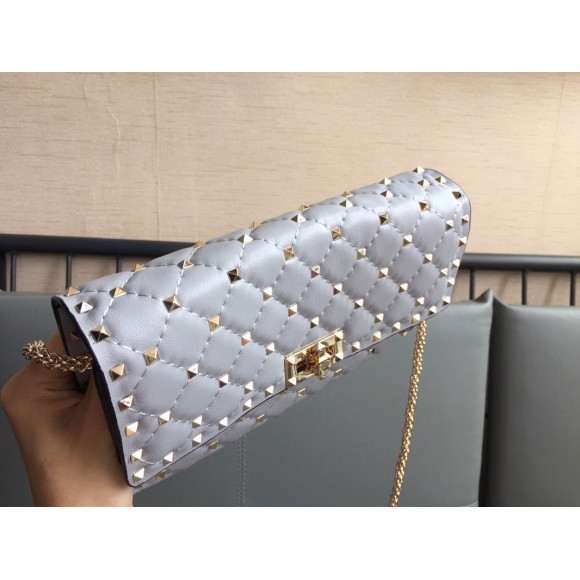 Valentino Rockstud Spike Crossbody Clutch Bag In Blue Lambskin